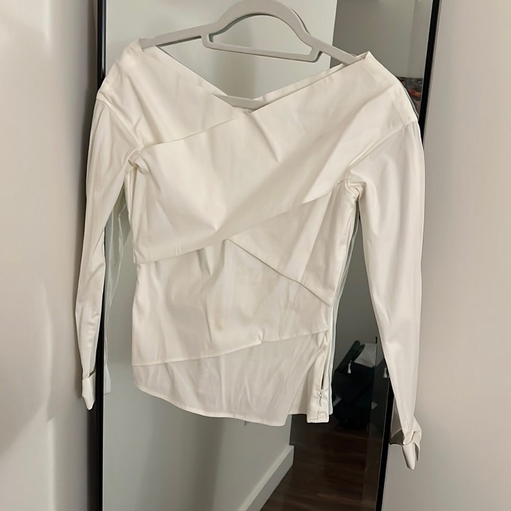 Very cute slightly off shoulder blouse.